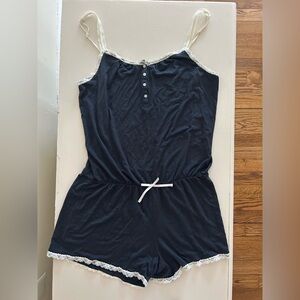 GAP Body Navy Romper with White Lace Details 
Size: Small
EUC (Like New)